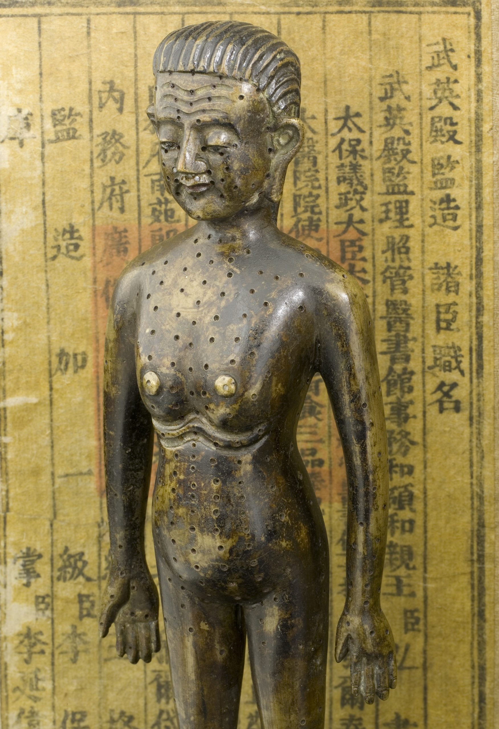 Chinese bronze acupuncture man created in 1027 AD by Wang Weiyi during the Song Dynasty to standardise meridian points for teaching and examinations